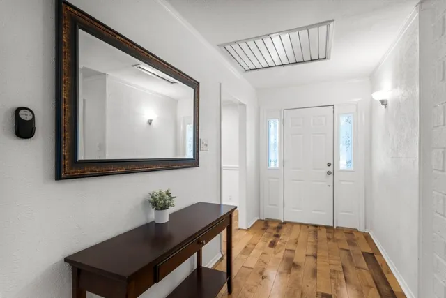 a view of a hallway with workspace