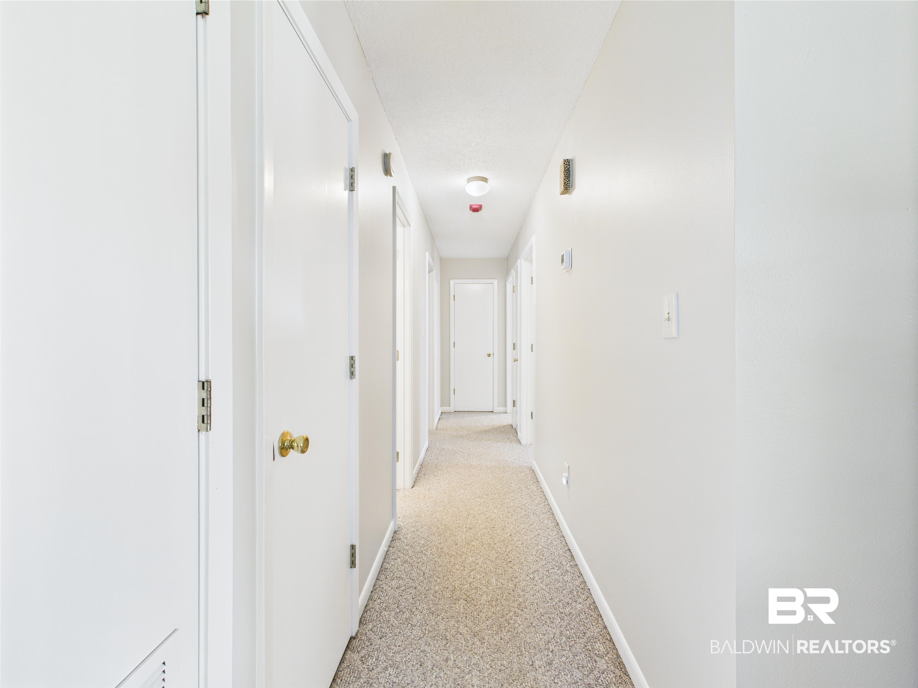 15148 Highland Circle Foley, AL 36535 - Photo 47 of 47 Hall featuring light carpet and baseboards