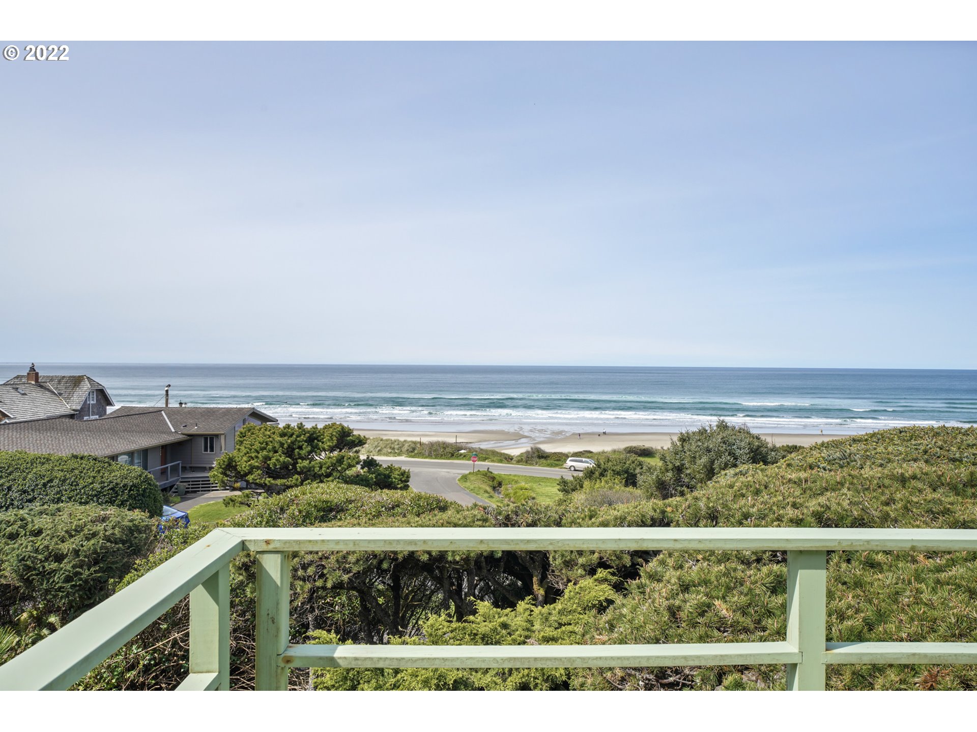 8125 Neahkahnie Road Nehalem, OR 97131 - Photo 15 of 32 a view of an ocean and a mountain