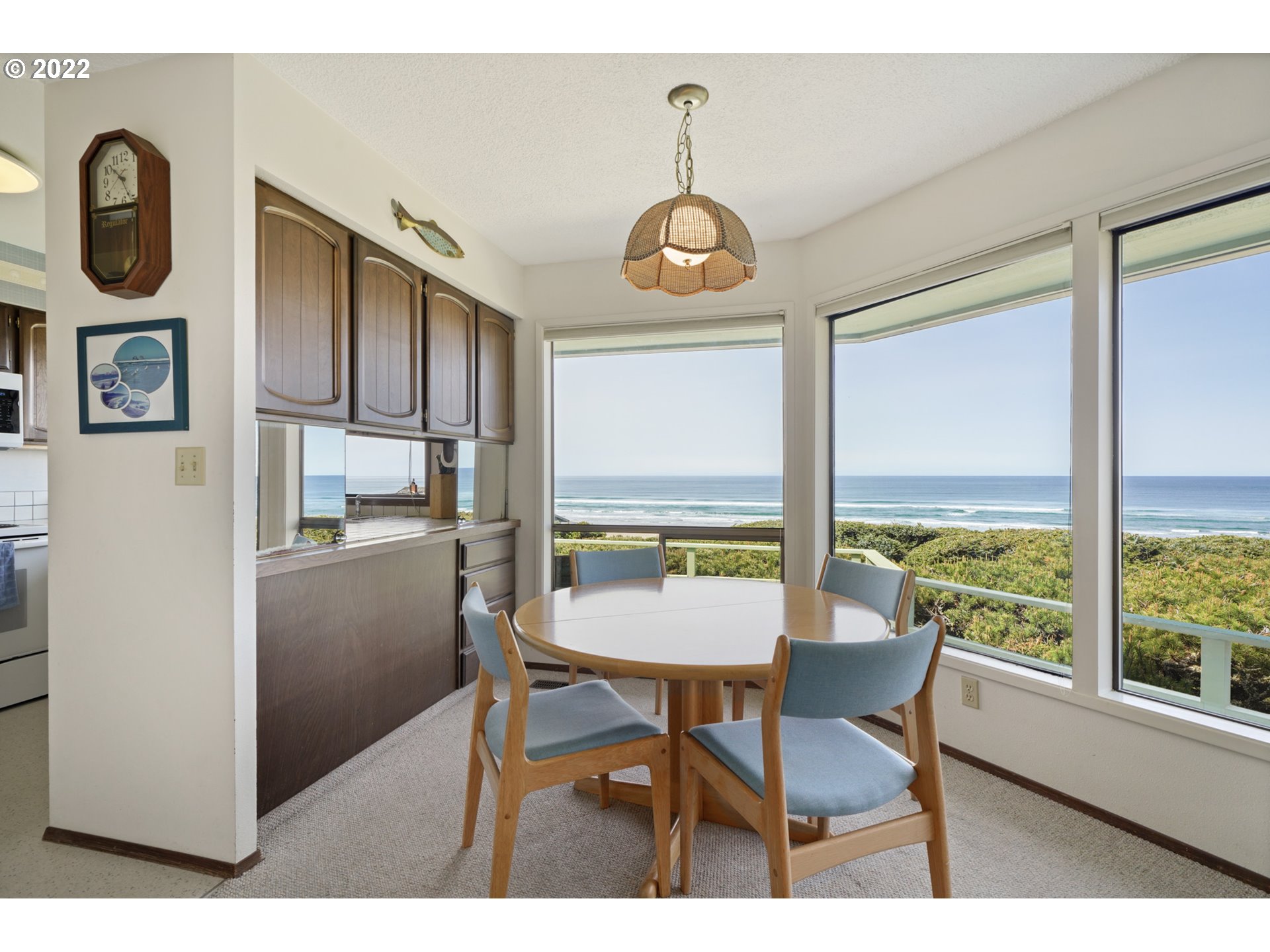 8125 Neahkahnie Road Nehalem, OR 97131 - Photo 5 of 32 a view of a dining room with furniture window and outside view