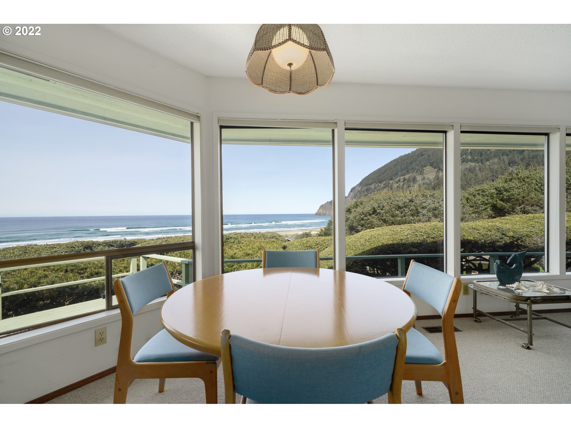 8125 Neahkahnie Road Nehalem, OR 97131 - Photo 6 of 32 a view of a dining room with furniture window and outside view
