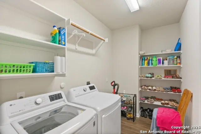 a utility room with dryer and washer