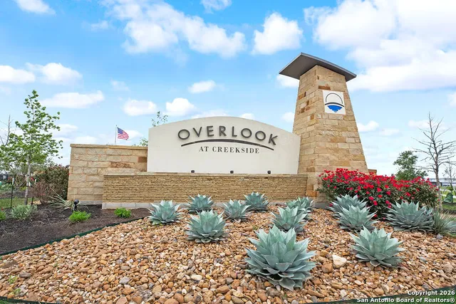 a sign on the side of the road