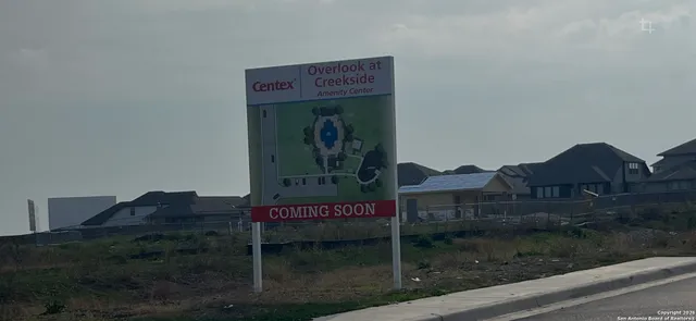 a red sign that is on the side of a road