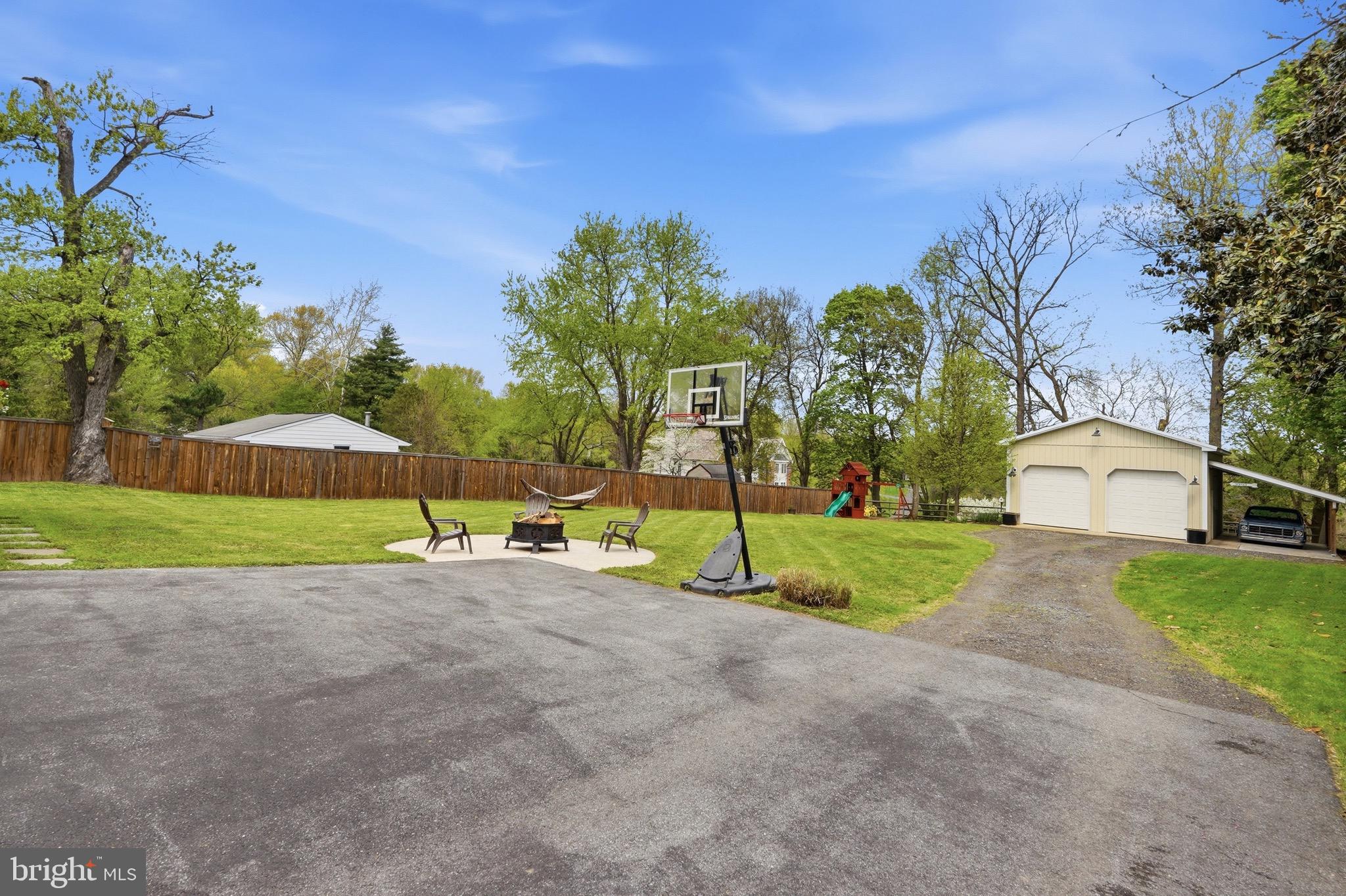 23725 Woodfield Road Gaithersburg, MD 20882 - Photo 40 of 61 a view of a park with a house