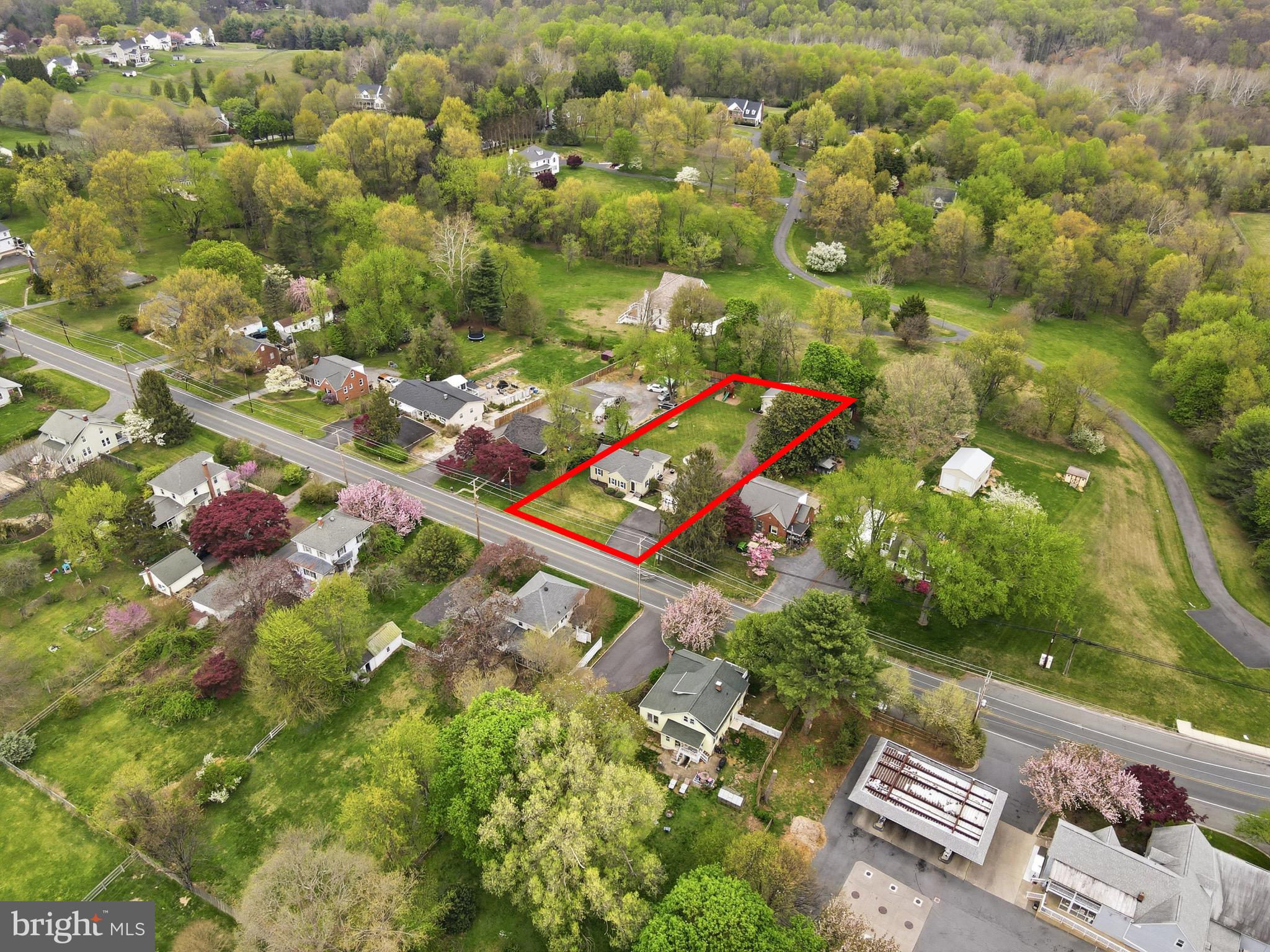 23725 Woodfield Road Gaithersburg, MD 20882 - Photo 50 of 61 an aerial view of a residential houses with outdoor space