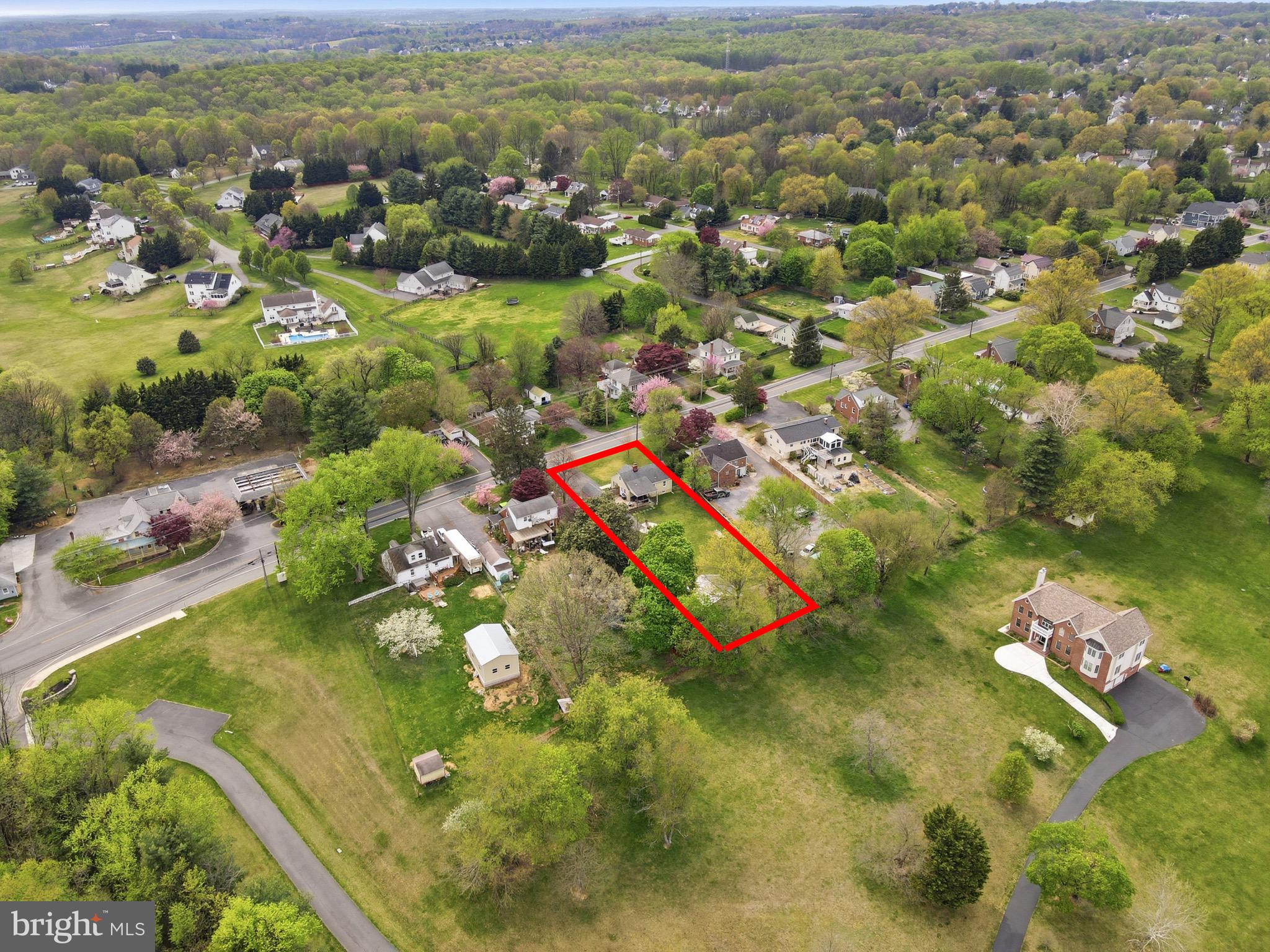 23725 Woodfield Road Gaithersburg, MD 20882 - Photo 56 of 61 an aerial view of residential houses with outdoor space