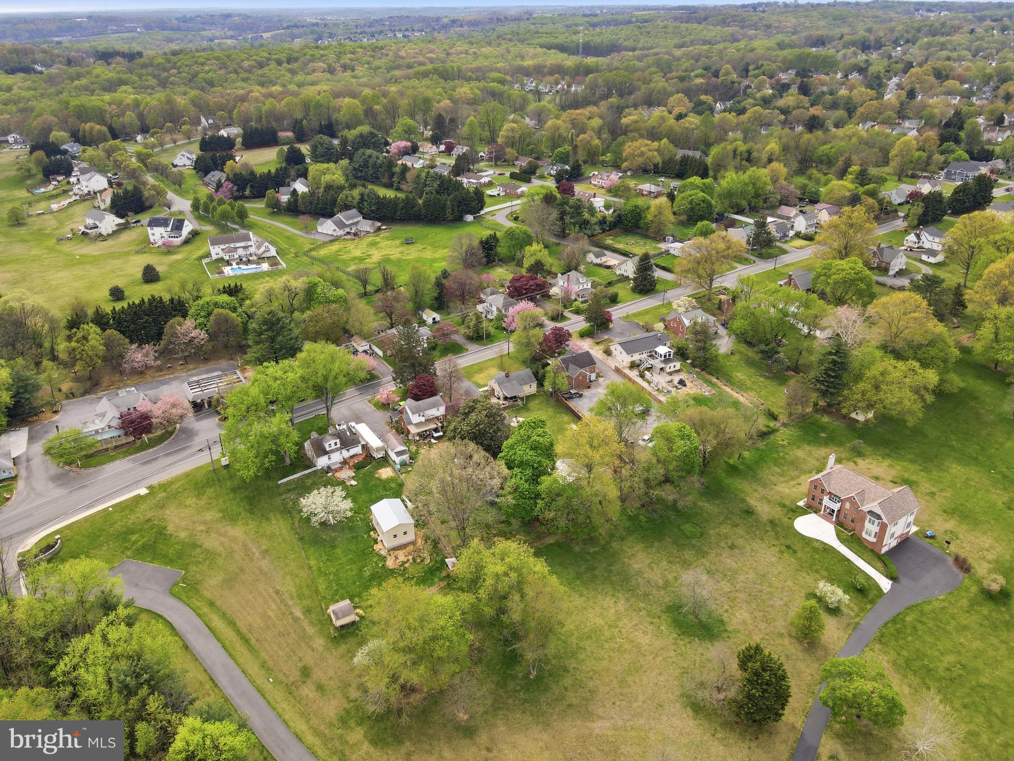 23725 Woodfield Road Gaithersburg, MD 20882 - Photo 57 of 61 an aerial view of residential houses with outdoor space