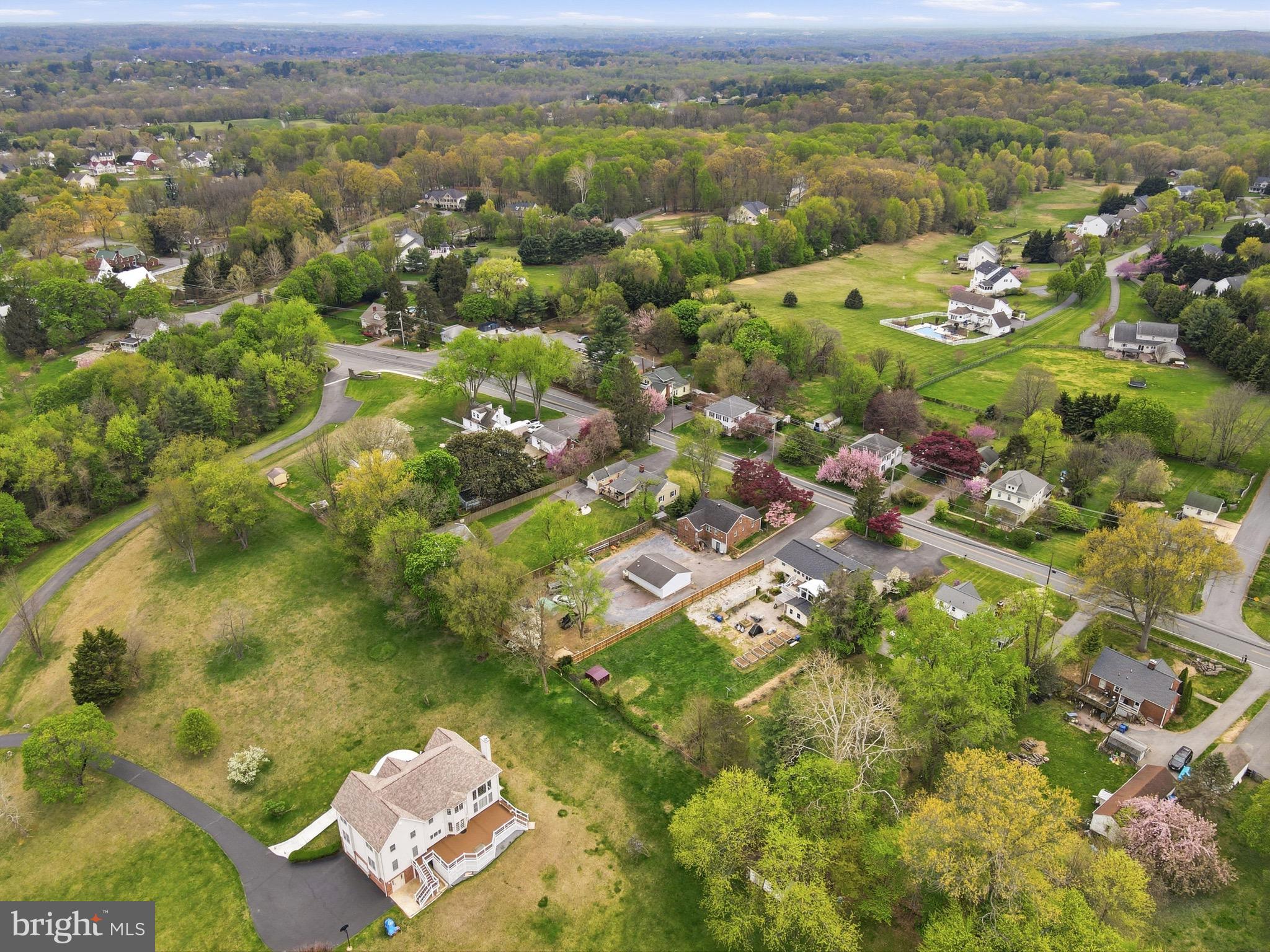 23725 Woodfield Road Gaithersburg, MD 20882 - Photo 59 of 61 an aerial view of residential houses with outdoor space