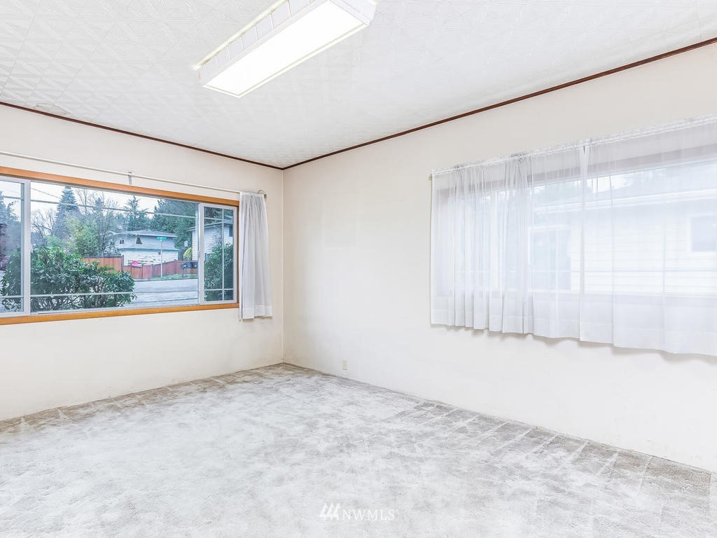 2331 Northeast 12th Street Renton, WA 98056 - Photo 3 of 21 an empty room with a empty space and windows