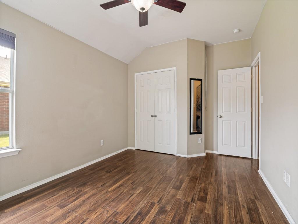 119 Robin Lane Forney, TX 75126 - Photo 22 of 27 Vaulted ceiling room with wood-finish flooring, a window with blinds, and white trim