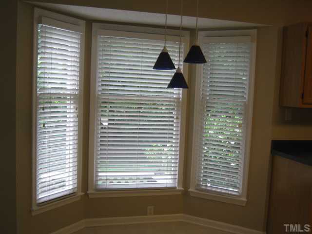 5816 Edgebury Road Raleigh, NC 27613 - Photo 7 of 12 Breakfast Area with Bay Window and New Light Fixture!