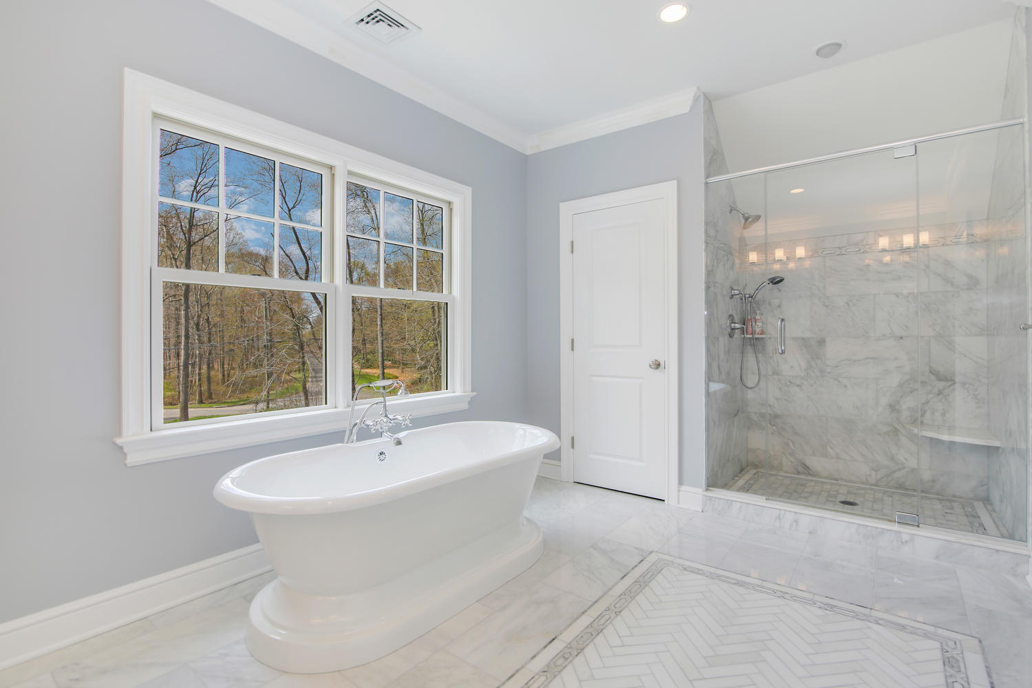 729 Cheese Spring Road New Canaan, CT 06840 - Photo 17 of 37 a bathroom with a sink and a bathtub
