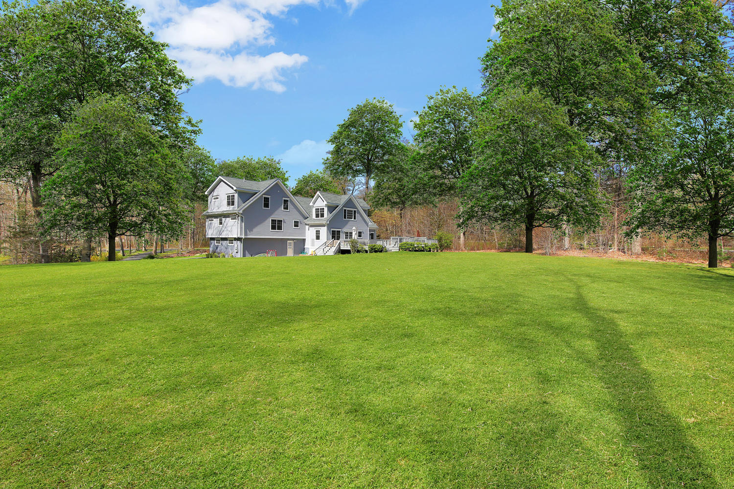 729 Cheese Spring Road New Canaan, CT 06840 - Photo 30 of 37 a view of a green field