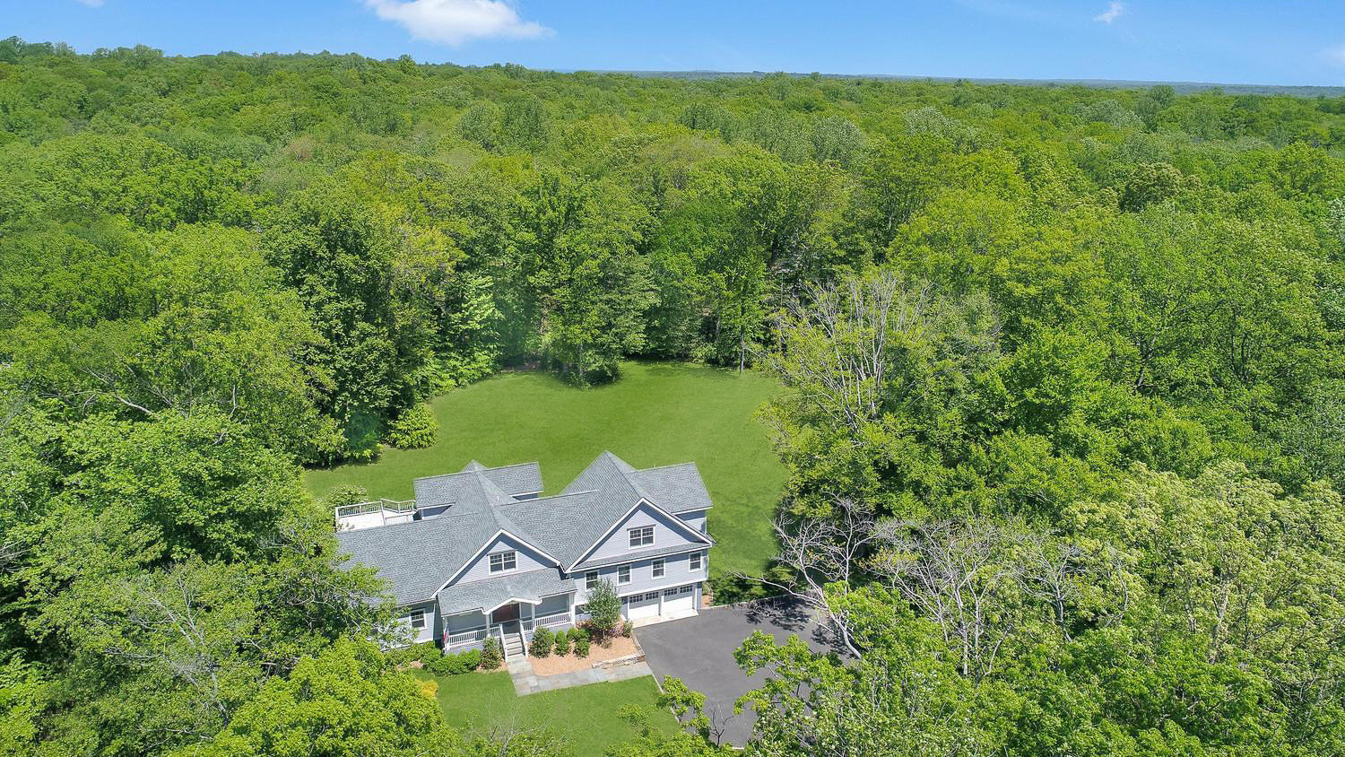 729 Cheese Spring Road New Canaan, CT 06840 - Photo 32 of 37 an aerial view of a house with yard and outdoor space