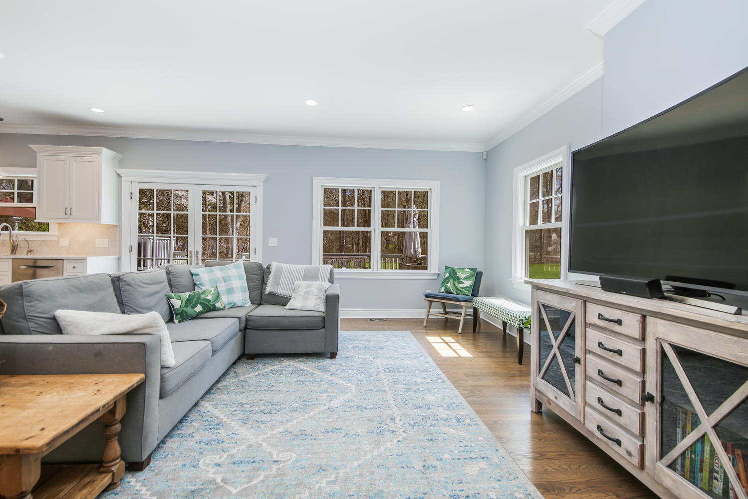 729 Cheese Spring Road New Canaan, CT 06840 - Photo 6 of 37 a living room with furniture tv and large window