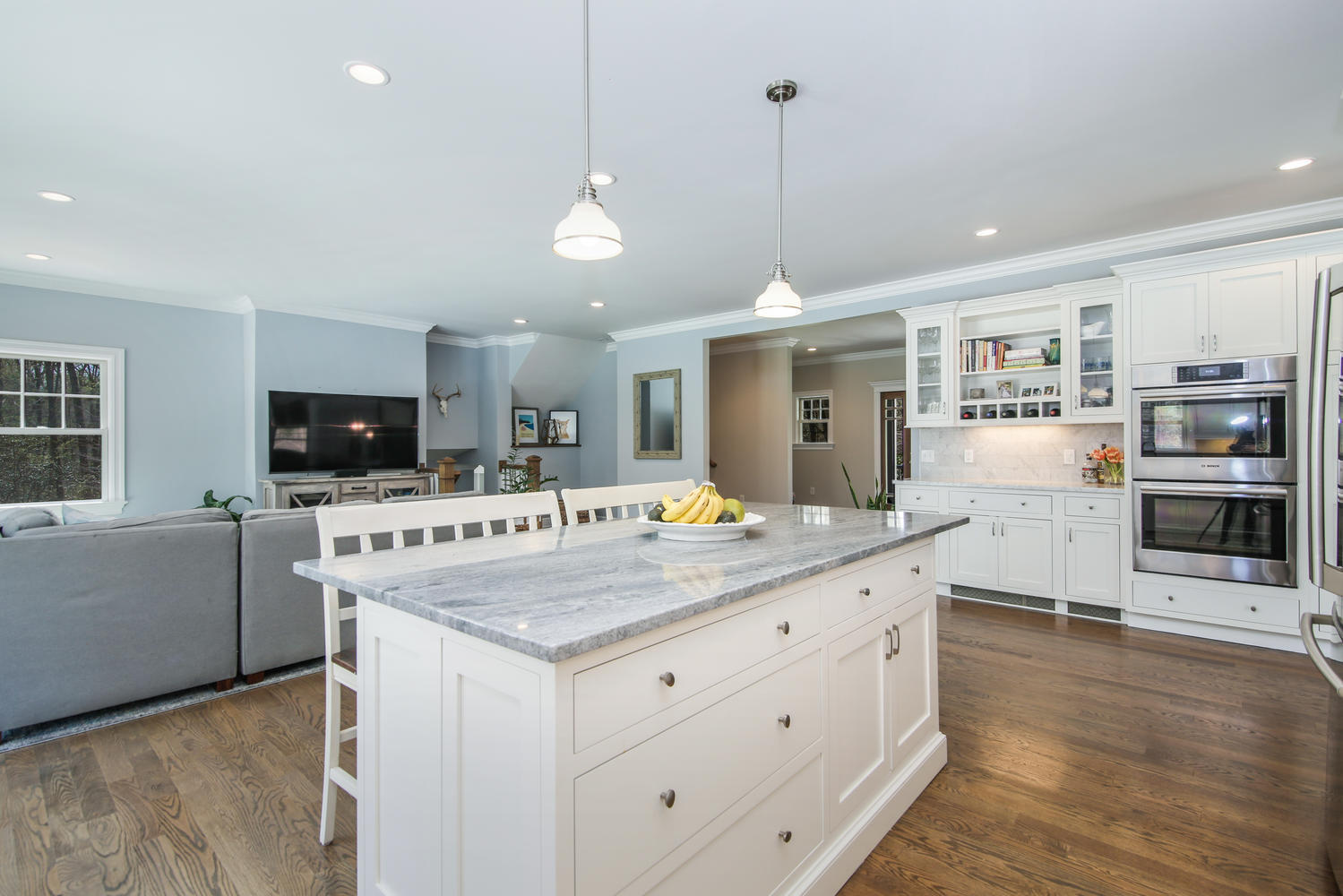 729 Cheese Spring Road New Canaan, CT 06840 - Photo 9 of 37 a kitchen with stainless steel appliances kitchen island granite countertop a stove top oven a sink a dining table and chairs