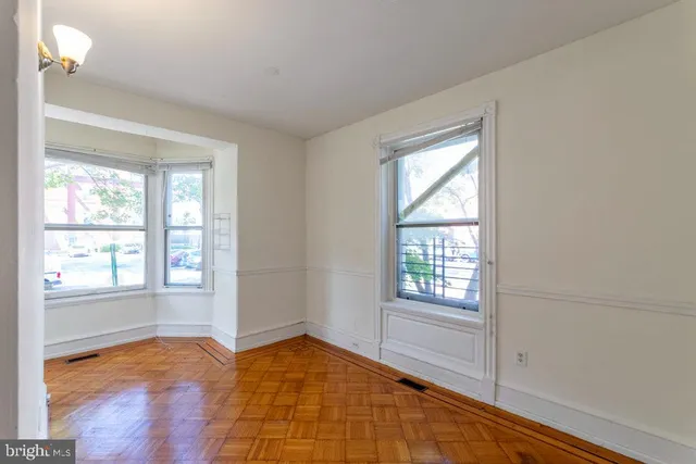 a view of an empty room and window