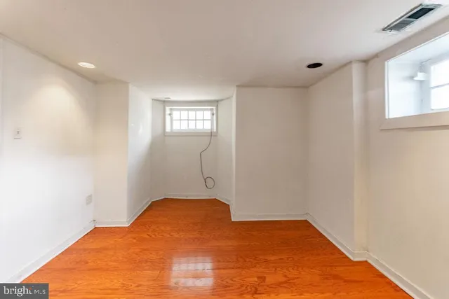 a view of empty room with windows
