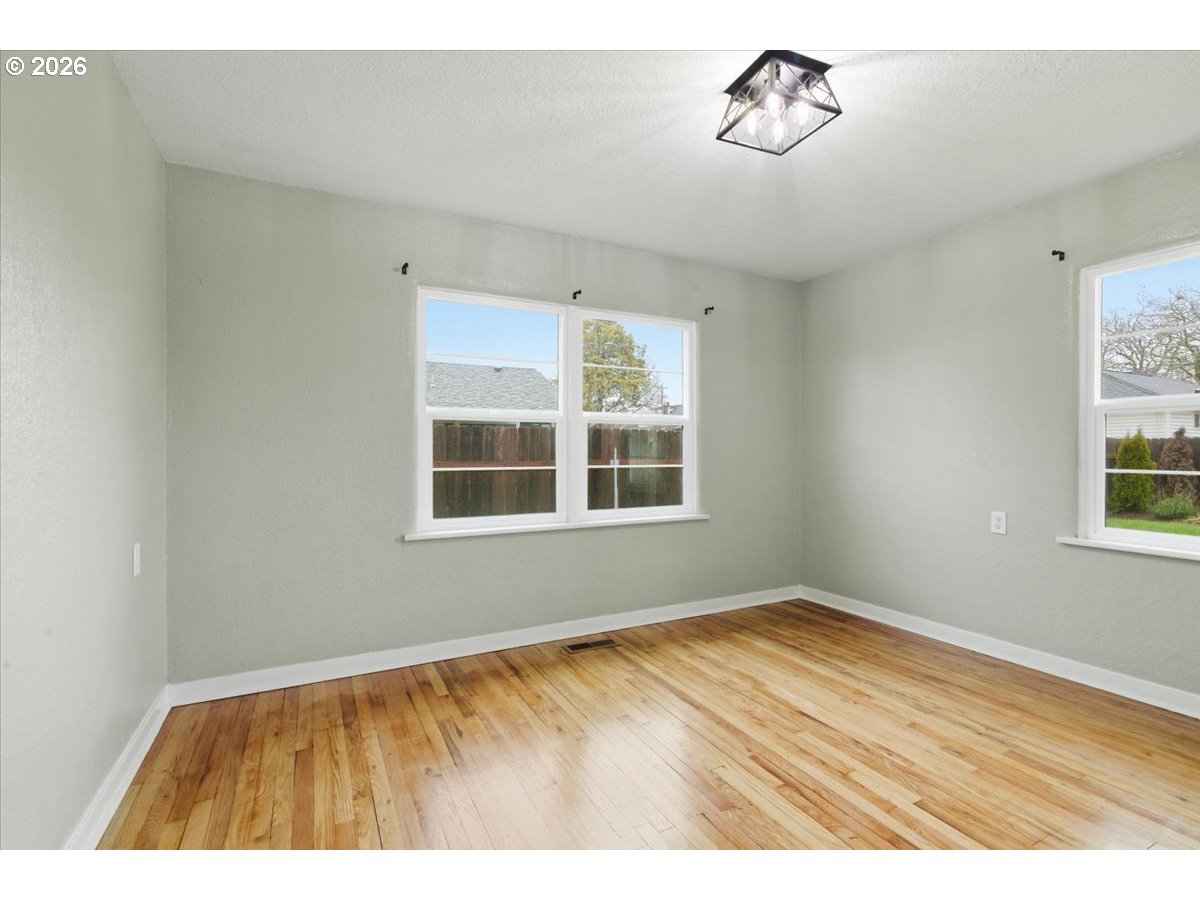 1084 24th Street Northeast Salem, OR 97301 - Photo 21 of 30 a view of an empty room with a window