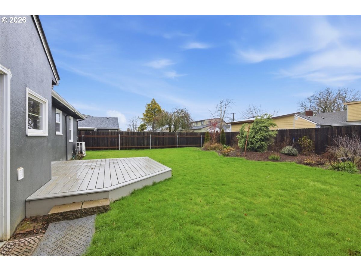 1084 24th Street Northeast Salem, OR 97301 - Photo 25 of 30 a view of a house with backyard and a patio