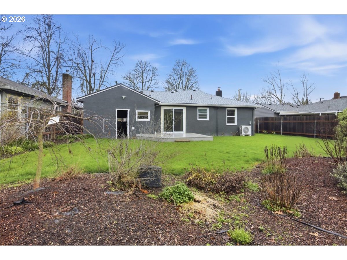 1084 24th Street Northeast Salem, OR 97301 - Photo 26 of 30 a view of a house with a yard