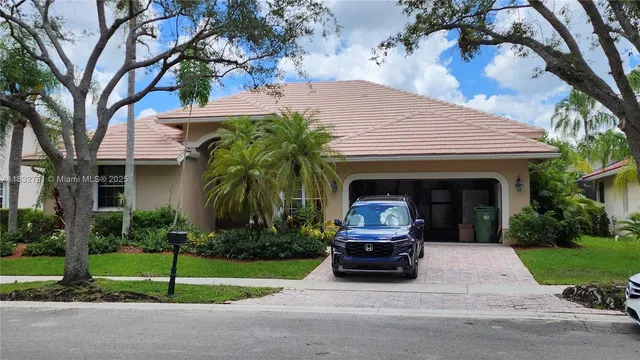 a house view with a garden space