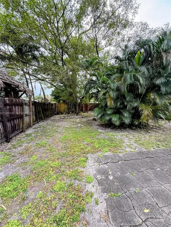 a view of backyard with green space