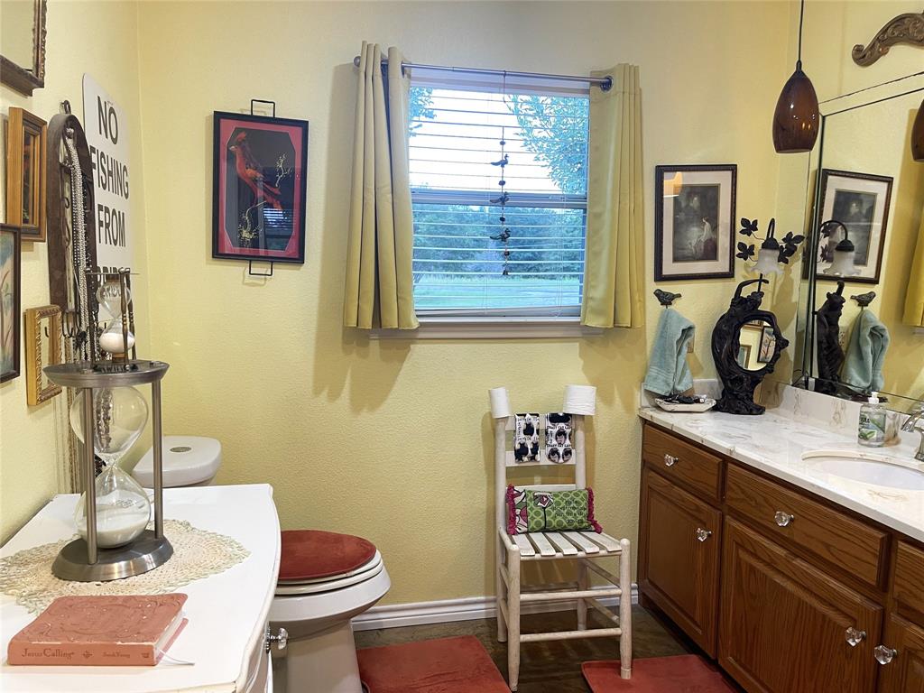151 Lcr Cedar C3 Mexia, TX 76667 - Photo 13 of 28 a bathroom with a sink and a mirror