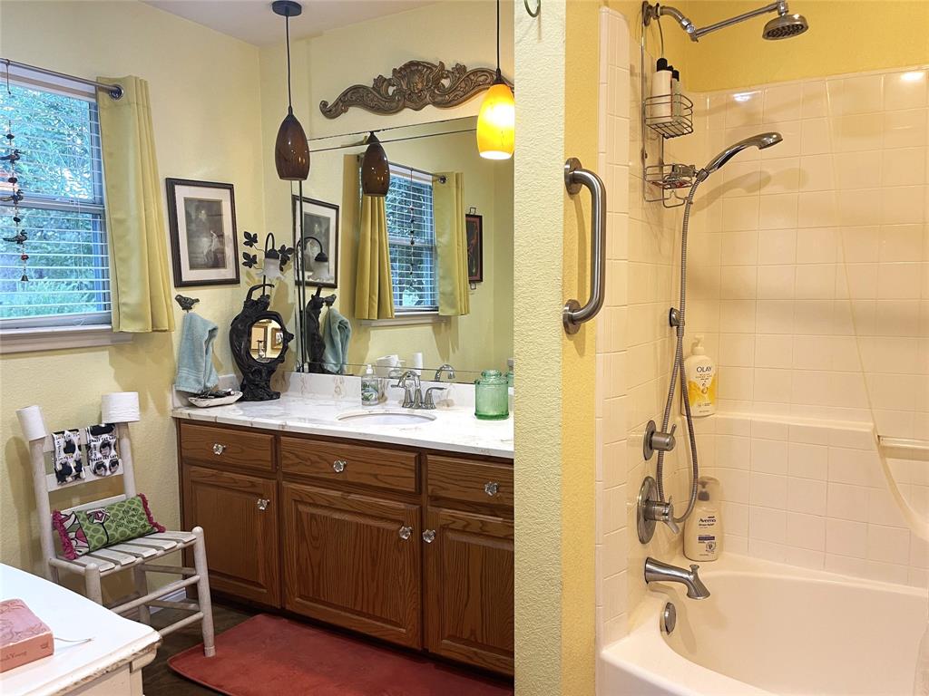 151 Lcr Cedar C3 Mexia, TX 76667 - Photo 14 of 28 a bathroom with a double vanity sink mirror and shower