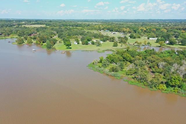 151 Lcr Cedar C3 Mexia, TX 76667 - Photo 20 of 28 an aerial view of residential houses with outdoor space and trees