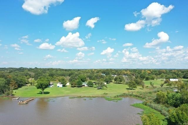 151 Lcr Cedar C3 Mexia, TX 76667 - Photo 21 of 28 a view of a lake with a houses
