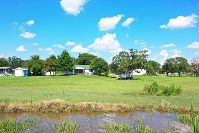 151 Lcr Cedar C3 Mexia, TX 76667 - Photo 25 of 28 a view of a golf course with a lake