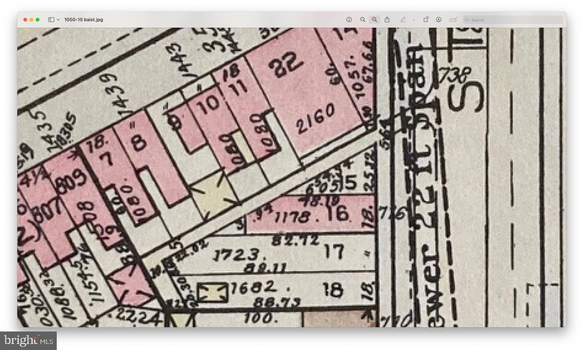 a sign broad on a brick wall