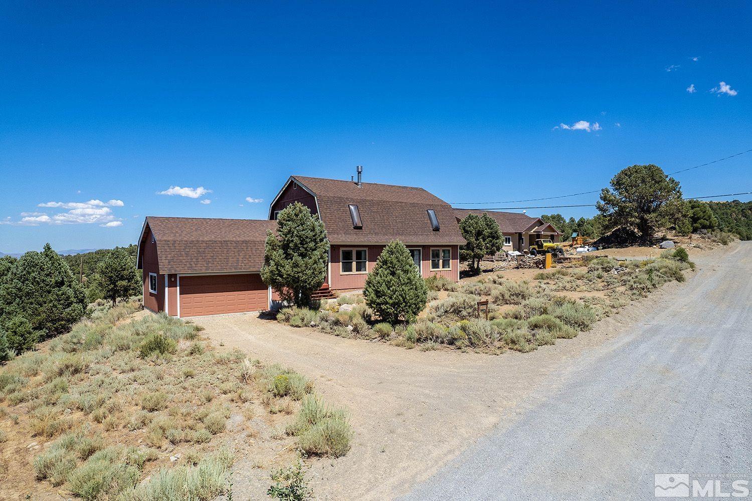 21400 Graves Road Reno, NV 89521 - Photo 1 of 21 a view of a house with a yard and sitting area