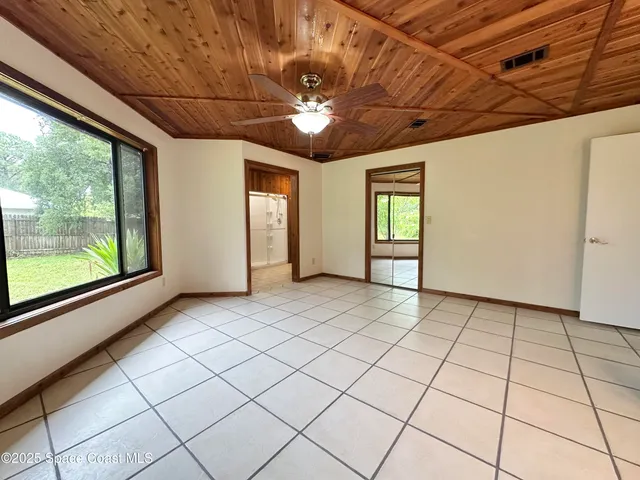 a view of a refrigerator and window