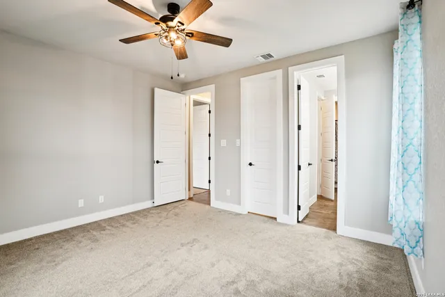 a bathroom with a double vanity sink mirror and double