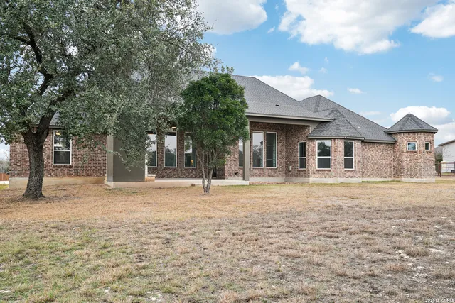 a view of a terrace with a yard