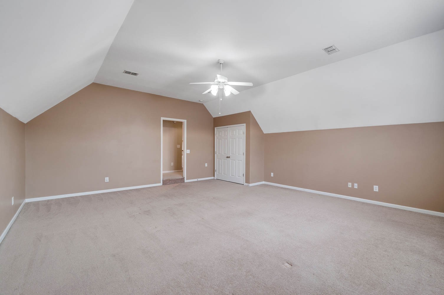 4074 Locerbie Circle Spring Hill, TN 37174 - Photo 18 of 23 a view of an empty room with a chandelier fan