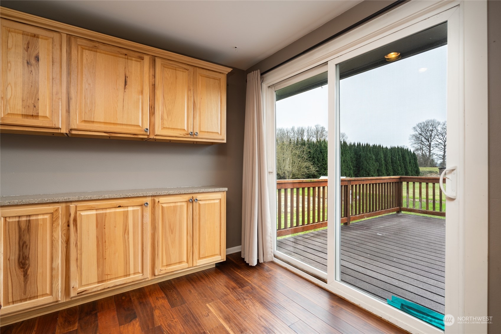 16678 Dike Road Mount Vernon, WA 98273 - Photo 12 of 37 a view of a porch with wooden floor and windows