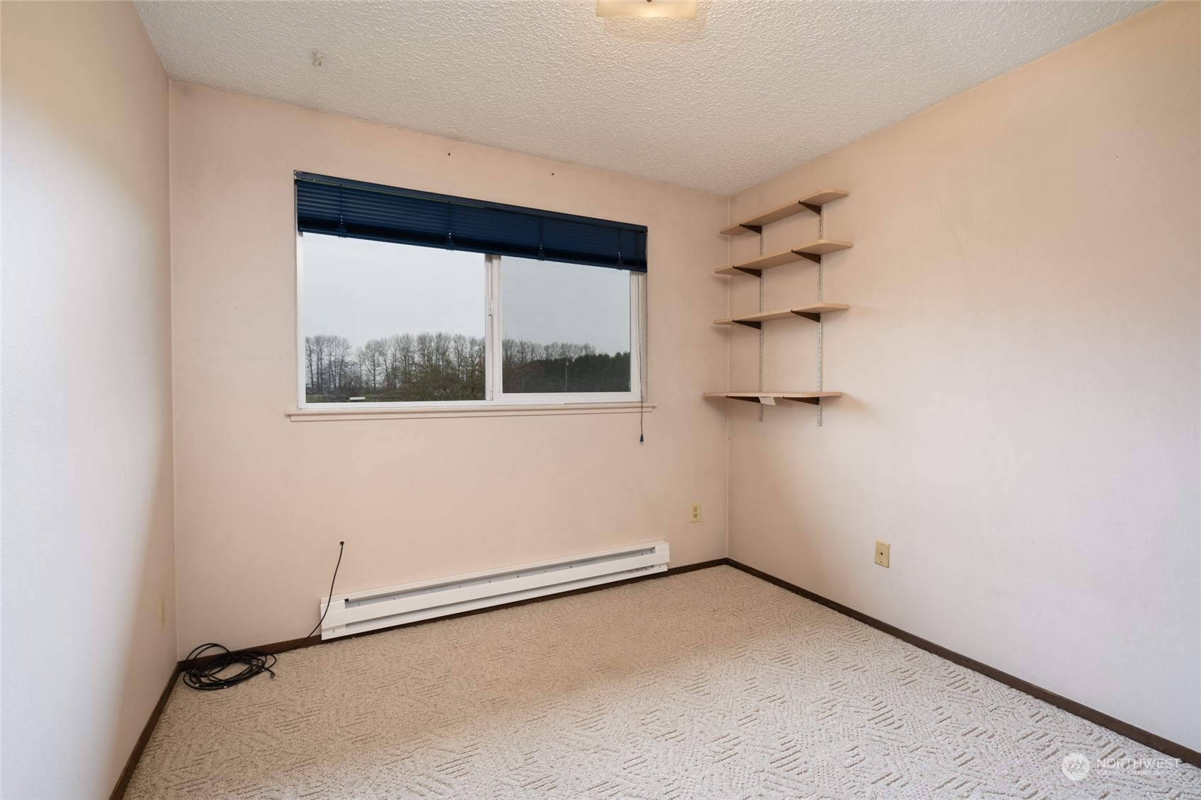 16678 Dike Road Mount Vernon, WA 98273 - Photo 17 of 37 an empty room with a window