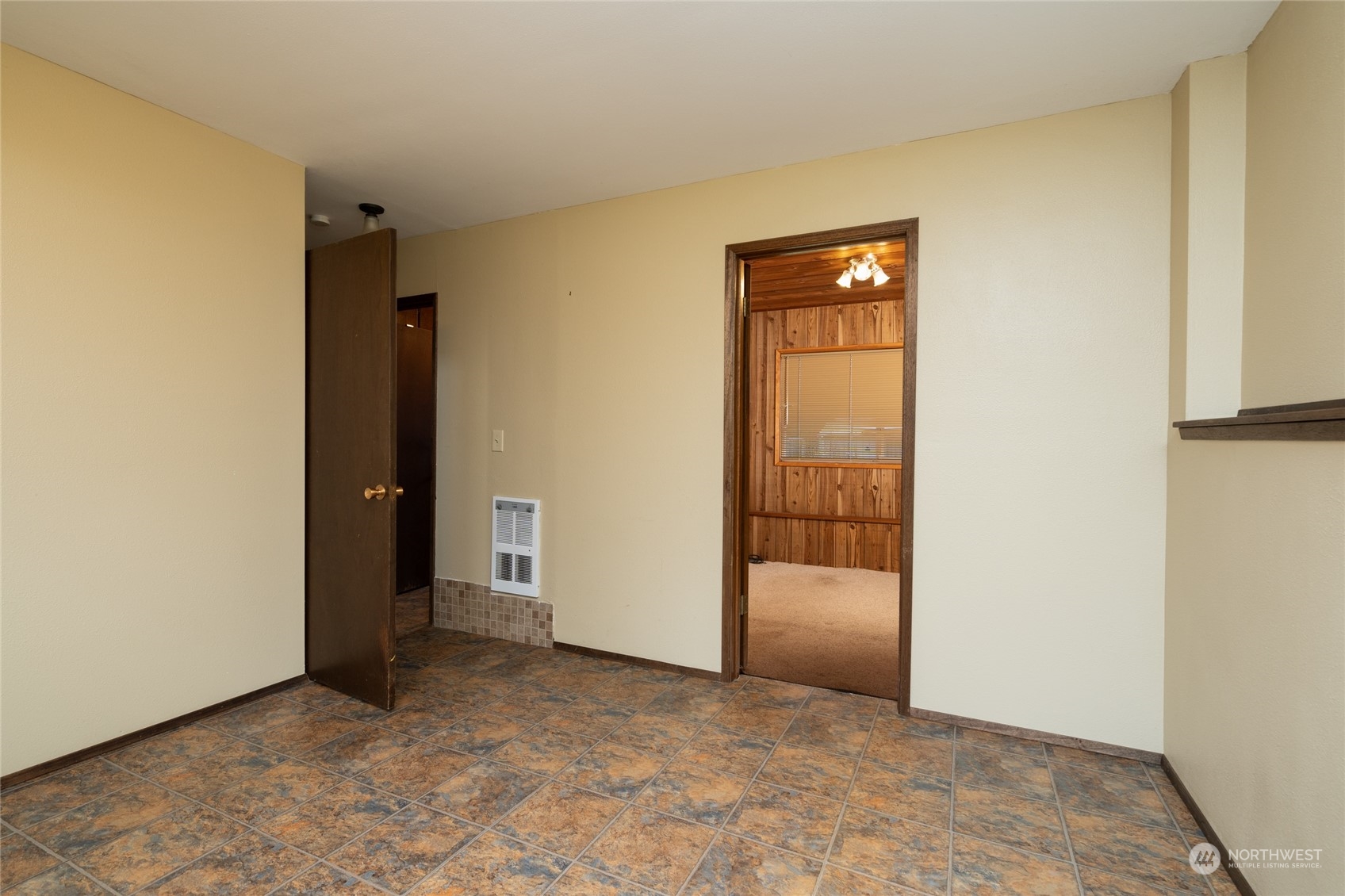 16678 Dike Road Mount Vernon, WA 98273 - Photo 22 of 37 an empty room with sliding door and door
