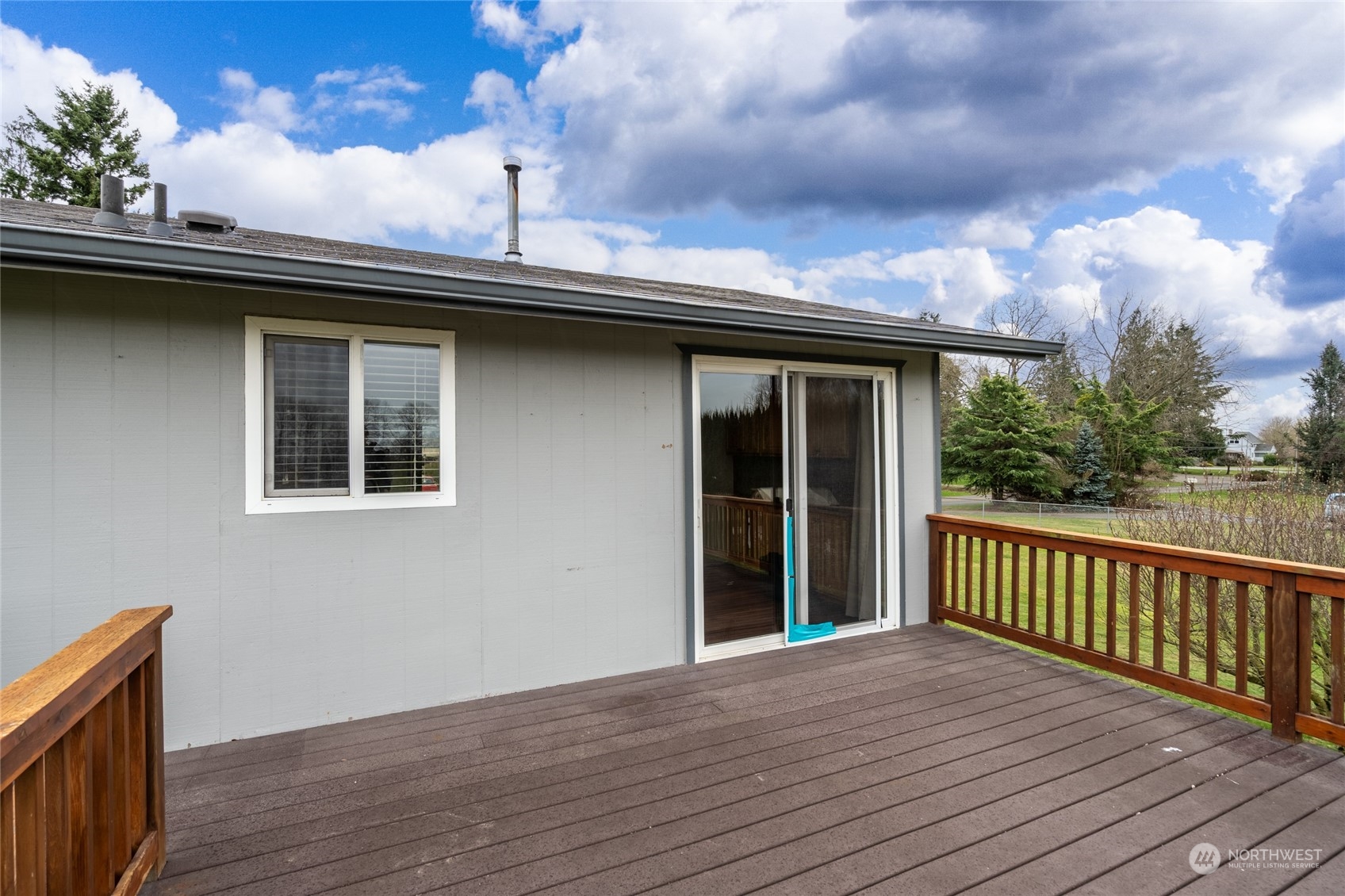 16678 Dike Road Mount Vernon, WA 98273 - Photo 23 of 37 a roof deck with wooden floor and fence