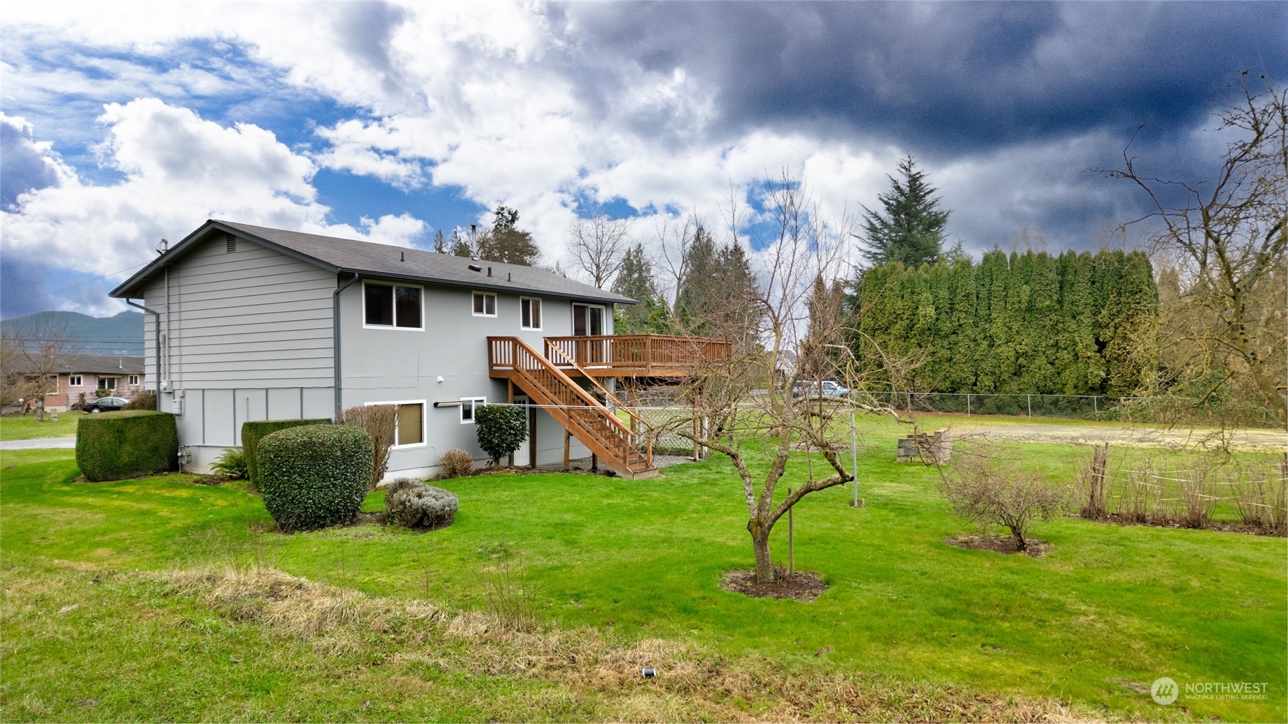 16678 Dike Road Mount Vernon, WA 98273 - Photo 27 of 37 a view of a house with a backyard