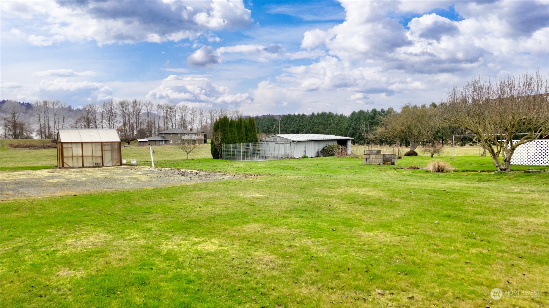 16678 Dike Road Mount Vernon, WA 98273 - Photo 28 of 37 a view of a garden with lawn chairs