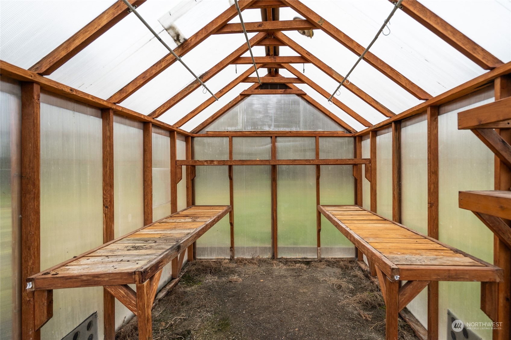16678 Dike Road Mount Vernon, WA 98273 - Photo 30 of 37 a balcony with furniture and wooden floor