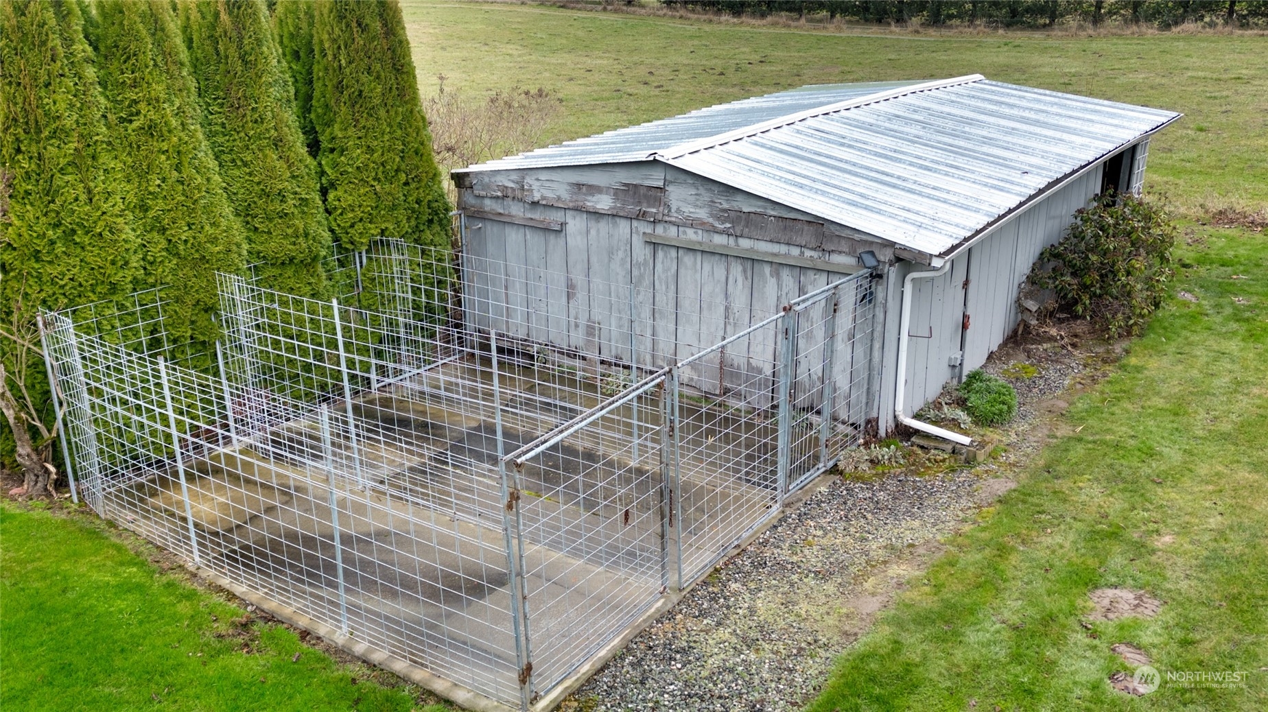16678 Dike Road Mount Vernon, WA 98273 - Photo 32 of 37 a view of a backyard with a garden