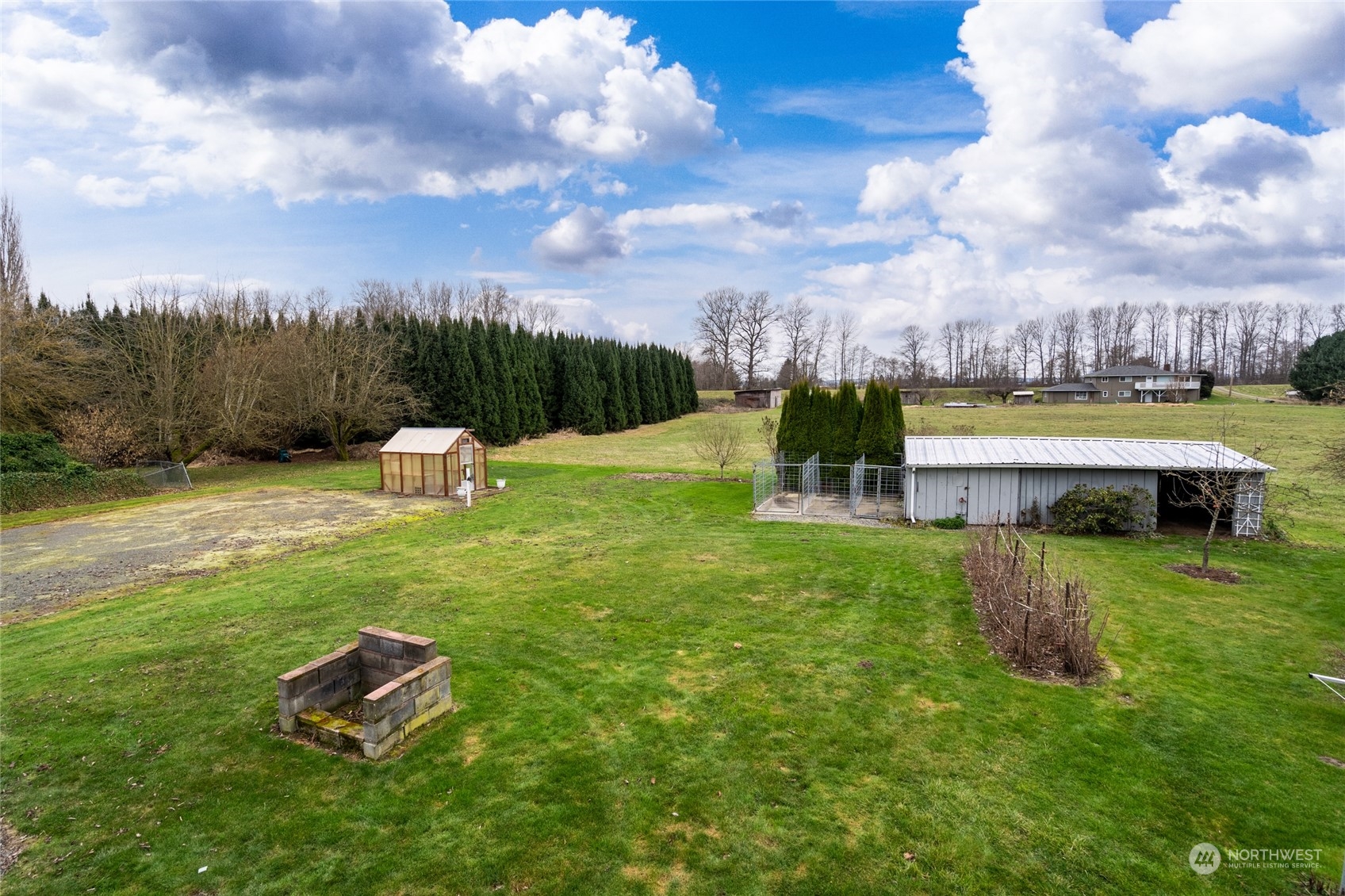16678 Dike Road Mount Vernon, WA 98273 - Photo 34 of 37 a view of a garden with lawn chairs