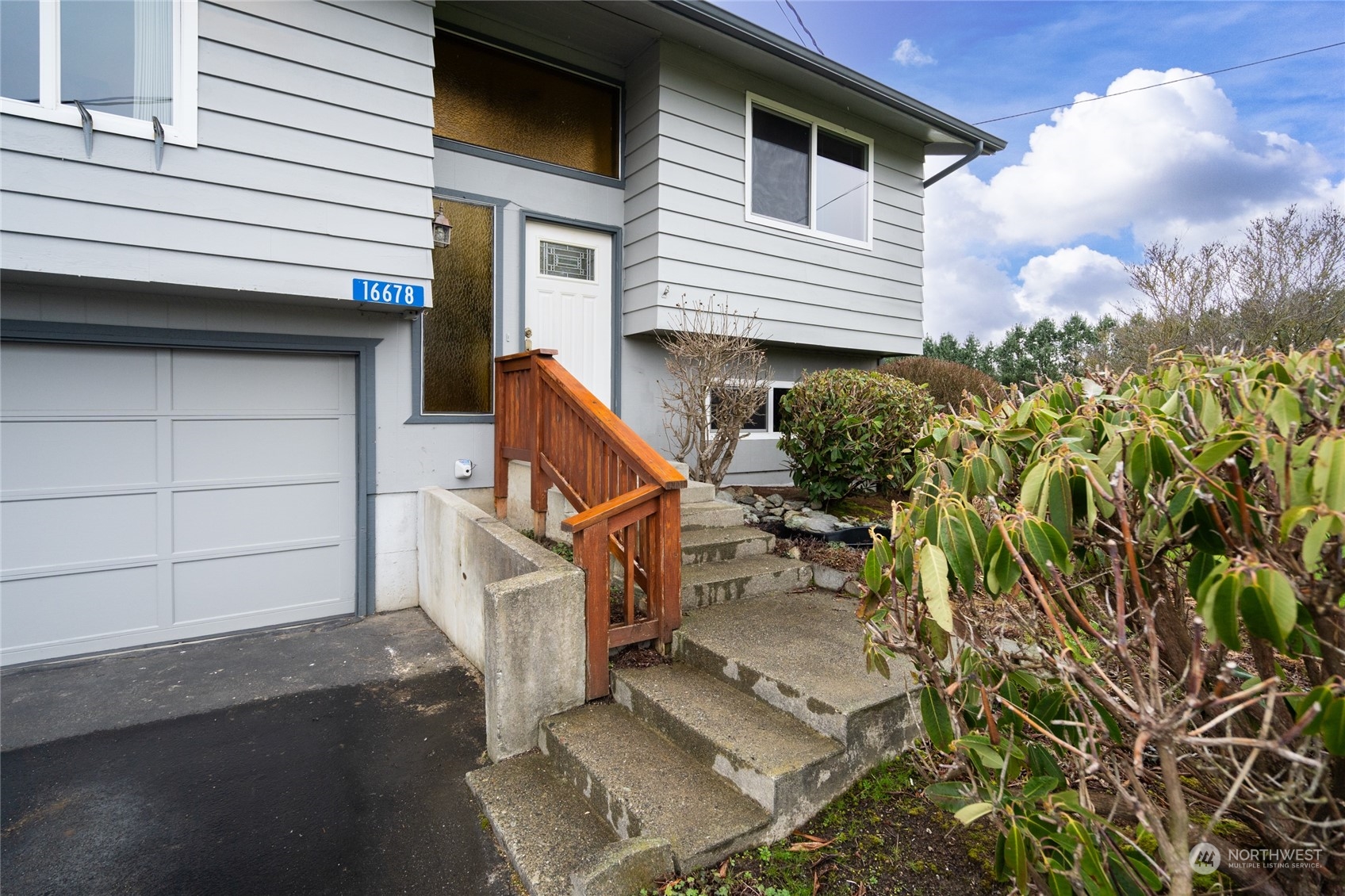 16678 Dike Road Mount Vernon, WA 98273 - Photo 5 of 37 a view of a house with a yard and sitting area