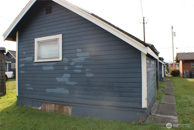 a brick house with a small yard